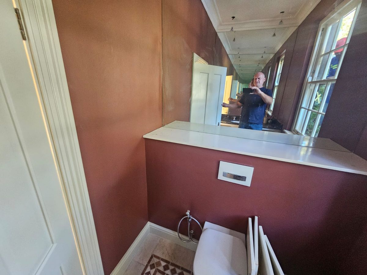 Bathroom stripped back before wet-area waterproofing